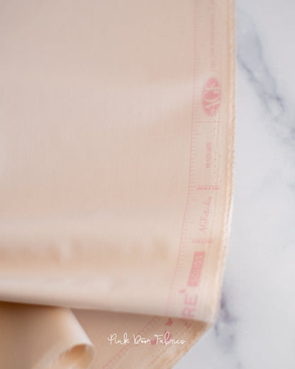 Cotton quilting fabric pattern called 'Latte'. Part of the 'Pure Solids' fabric collection. Designed by Art Gallery Fabrics for fabric company Art Gallery Fabrics. SKU: PE-523. 44-45 inch width.