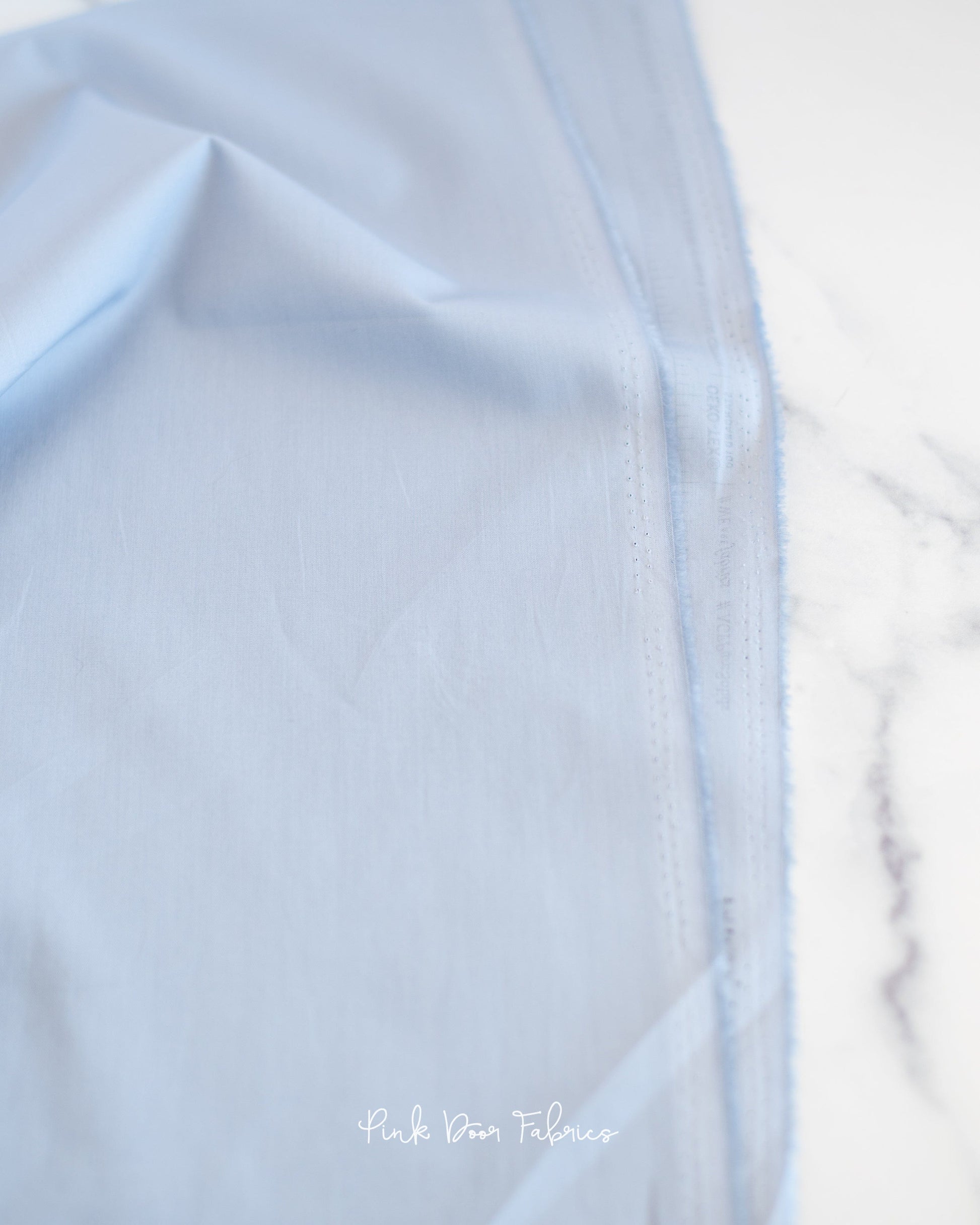 Cotton quilting fabric pattern called 'Atmospheric'. Part of the 'Pure Solids' fabric collection. Designed by Art Gallery Fabrics for fabric company Art Gallery Fabrics. SKU: PE-530. 44-45 inch width.