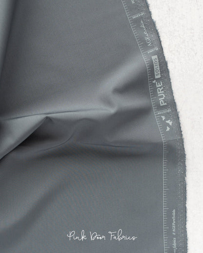 Cotton quilting fabric pattern called 'Slate'. Part of the 'Pure Solids' fabric collection. Designed by Art Gallery Fabrics for fabric company Art Gallery Fabrics. SKU: PE-557. 44-45 inch width.