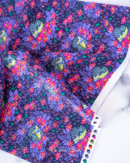 Cotton quilting fabric pattern called 'Who's Your Dandy in Glimmer'. Part of the 'Tiny Beasts' fabric collection. Designed by Tula Pink for fabric company Free Spirit Fabrics. SKU: PWTP182.GLIMMER. 44-45 inch width.