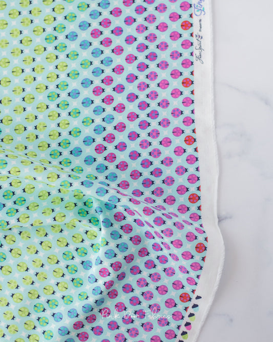 Cotton quilting fabric pattern called 'Painted Ladies in Glimmer'. Part of the 'Tiny Beasts' fabric collection. Designed by Tula Pink for fabric company Free Spirit Fabrics. SKU: PWTP183.GLIMMER. 44-45 inch width.