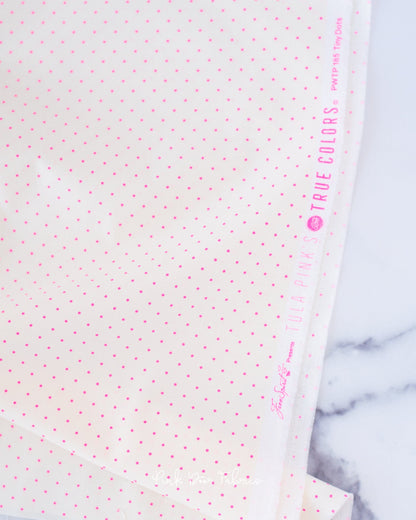 Cotton quilting fabric pattern called 'Tiny Dots in Cosmic'. Part of the 'True Colors' fabric collection. Designed by Tula Pink for fabric company Free Spirit Fabrics. SKU: PWTP185.COSMIC. 44-45 inch width.