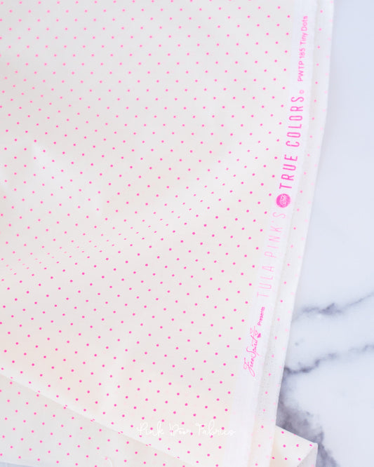 Cotton quilting fabric pattern called 'Tiny Dots in Cosmic'. Part of the 'True Colors' fabric collection. Designed by Tula Pink for fabric company Free Spirit Fabrics. SKU: PWTP185.COSMIC. 44-45 inch width.