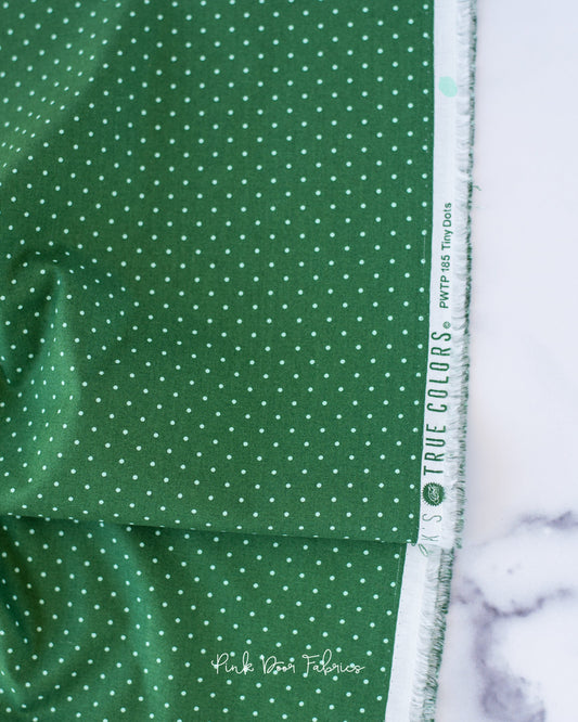 Cotton quilting fabric pattern called 'Tiny Dots in Lilypad'. Part of the 'True Colors' fabric collection. Designed by Tula Pink for fabric company Free Spirit Fabrics. SKU: PWTP185.LILYPAD. 44-45 inch width.