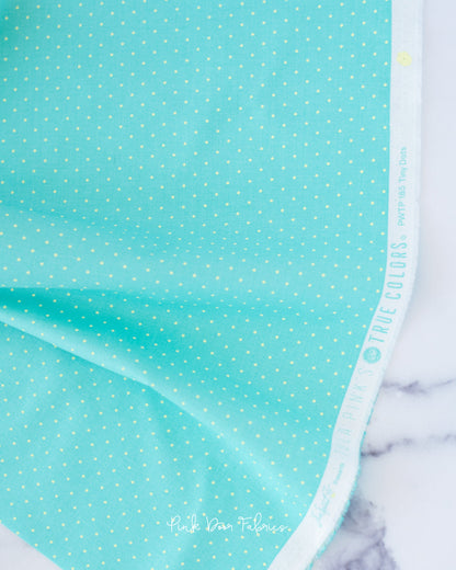 Cotton quilting fabric pattern called 'Tiny Dots in Peacock'. Part of the 'True Colors' fabric collection. Designed by Tula Pink for fabric company Free Spirit Fabrics. SKU: PWTP185.PEACOCK. 44-45 inch width.