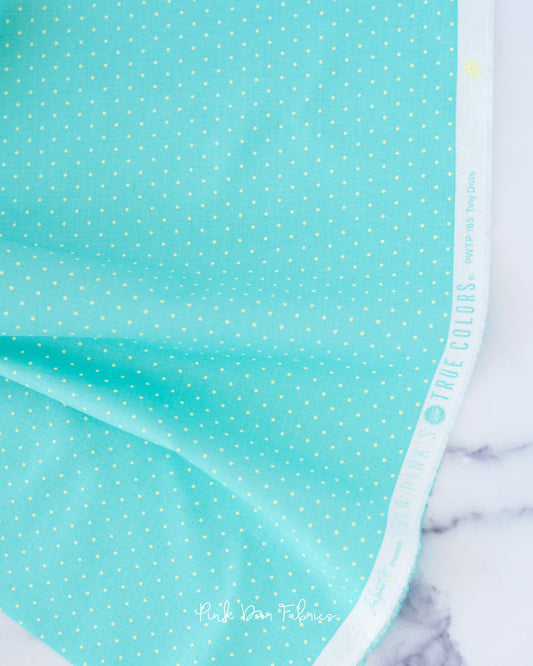 Cotton quilting fabric pattern called 'Tiny Dots in Peacock'. Part of the 'True Colors' fabric collection. Designed by Tula Pink for fabric company Free Spirit Fabrics. SKU: PWTP185.PEACOCK. 44-45 inch width.