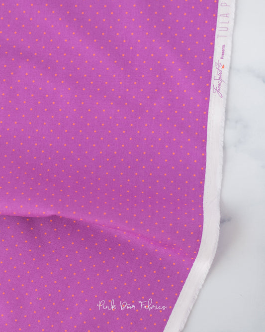 Cotton quilting fabric pattern called 'Tiny Dots in Thistle'. Part of the 'True Colors' fabric collection. Designed by Tula Pink for fabric company Free Spirit Fabrics. SKU: PWTP185.THISTLE. 44-45 inch width.