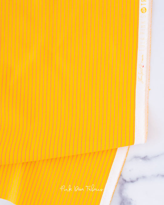 Cotton quilting fabric pattern called 'Tiny Stripes in Sunrise'. Part of the 'True Colors' fabric collection. Designed by Tula Pink for fabric company Free Spirit Fabrics. SKU: PWTP186.SUNRISE. 44-45 inch width.