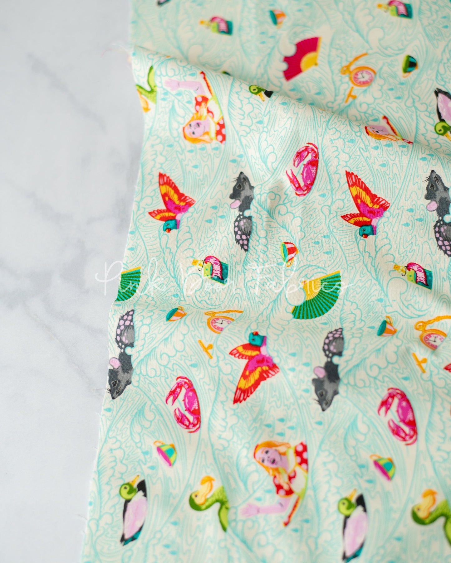 Cotton quilting fabric pattern called 'Sea of Tears in Wonder'. Part of the 'Curiouser & Curiouser' fabric collection. Designed by Tula Pink for fabric company Free Spirit Fabrics. SKU: PWTP162.WONDER. 44-45 inch width.