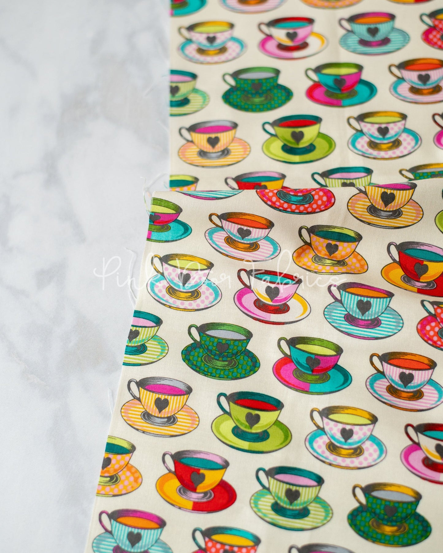 Cotton quilting fabric pattern called 'Tea Time in Sugar'. Part of the 'Curiouser & Curiouser' fabric collection. Designed by Tula Pink for fabric company Free Spirit Fabrics. SKU: PWTP163.SUGAR. 44-45 inch width.