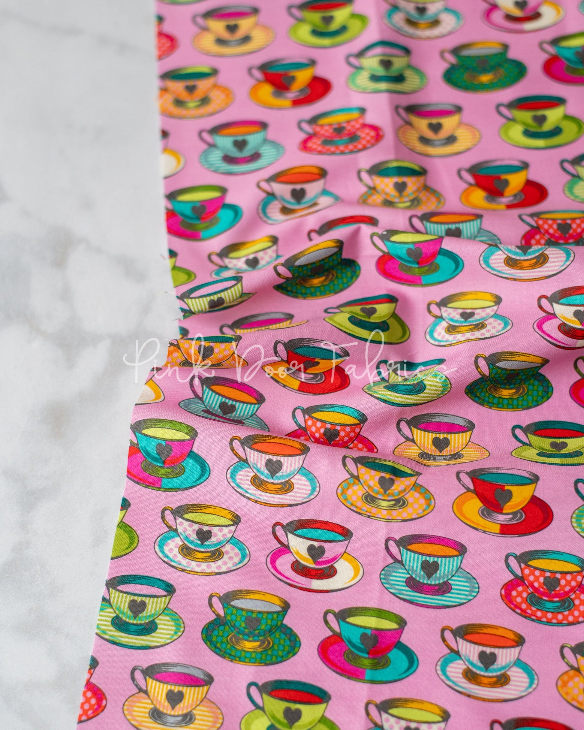 Cotton quilting fabric pattern called 'Tea Time in Wonder'. Part of the 'Curiouser & Curiouser' fabric collection. Designed by Tula Pink for fabric company Free Spirit Fabrics. SKU: PWTP163.WONDER. 44-45 inch width.