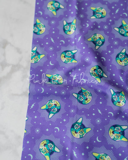 Cotton quilting fabric pattern called 'Cheshire in Daydream'. Part of the 'Curiouser & Curiouser' fabric collection. Designed by Tula Pink for fabric company Free Spirit Fabrics. SKU: PWTP164.DAYDREAM. 44-45 inch width.