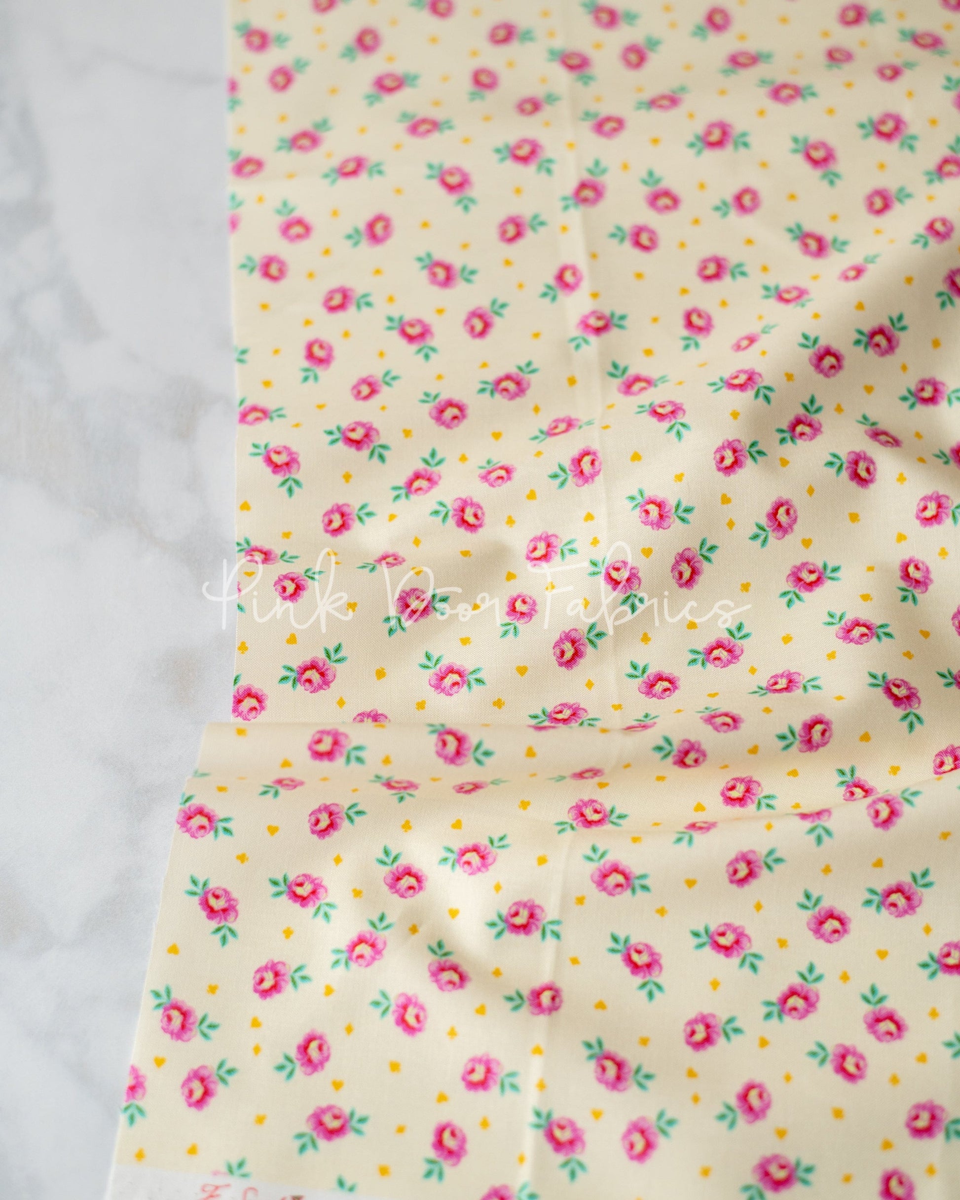 Cotton quilting fabric pattern called 'Baby Buds in Sugar'. Part of the 'Curiouser & Curiouser' fabric collection. Designed by Tula Pink for fabric company Free Spirit Fabrics. SKU: PWTP167.SUGAR. 44-45 inch width.