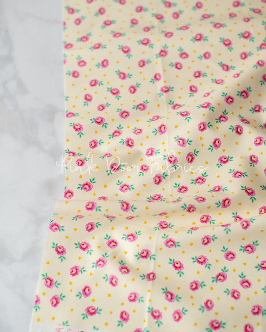 Cotton quilting fabric pattern called 'Baby Buds in Sugar'. Part of the 'Curiouser & Curiouser' fabric collection. Designed by Tula Pink for fabric company Free Spirit Fabrics. SKU: PWTP167.SUGAR. 44-45 inch width.