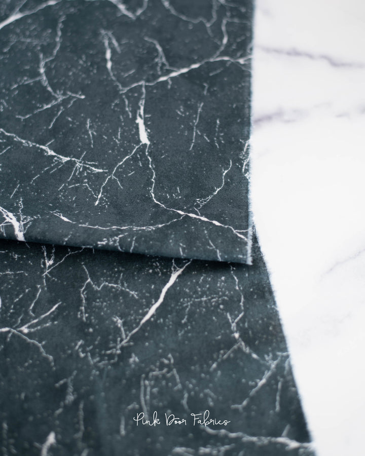 Cotton quilting fabric pattern called 'Pietra in Graphite'. Part of the 'Pietra' fabric collection. Designed by Giucy Giuce for fabric company Andover Fabrics. SKU: A-9881-C1. 44-45 inch width.