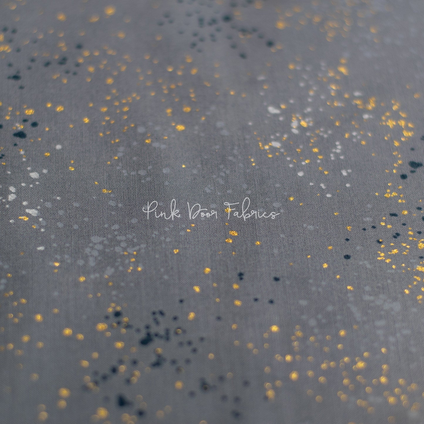 Cotton quilting fabric pattern called 'Cloud'. Part of the 'Speckled Metallic' fabric collection. Designed by Ruby Star Society for fabric company Moda Fabrics. SKU: RS5027 60M. 44-45 inch width.