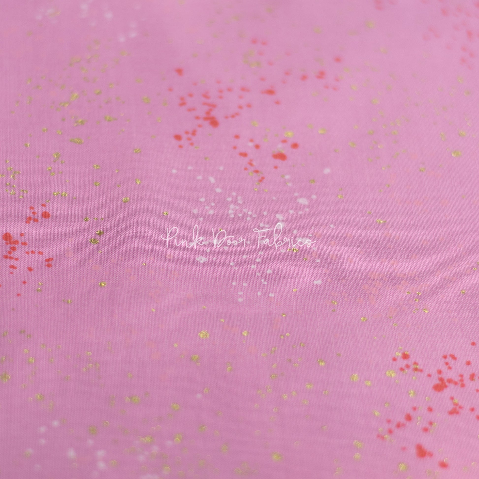 Cotton quilting fabric pattern called 'Daisy'. Part of the 'Speckled Metallic' fabric collection. Designed by Ruby Star Society for fabric company Moda Fabrics. SKU: RS5027 41M. 44-45 inch width.