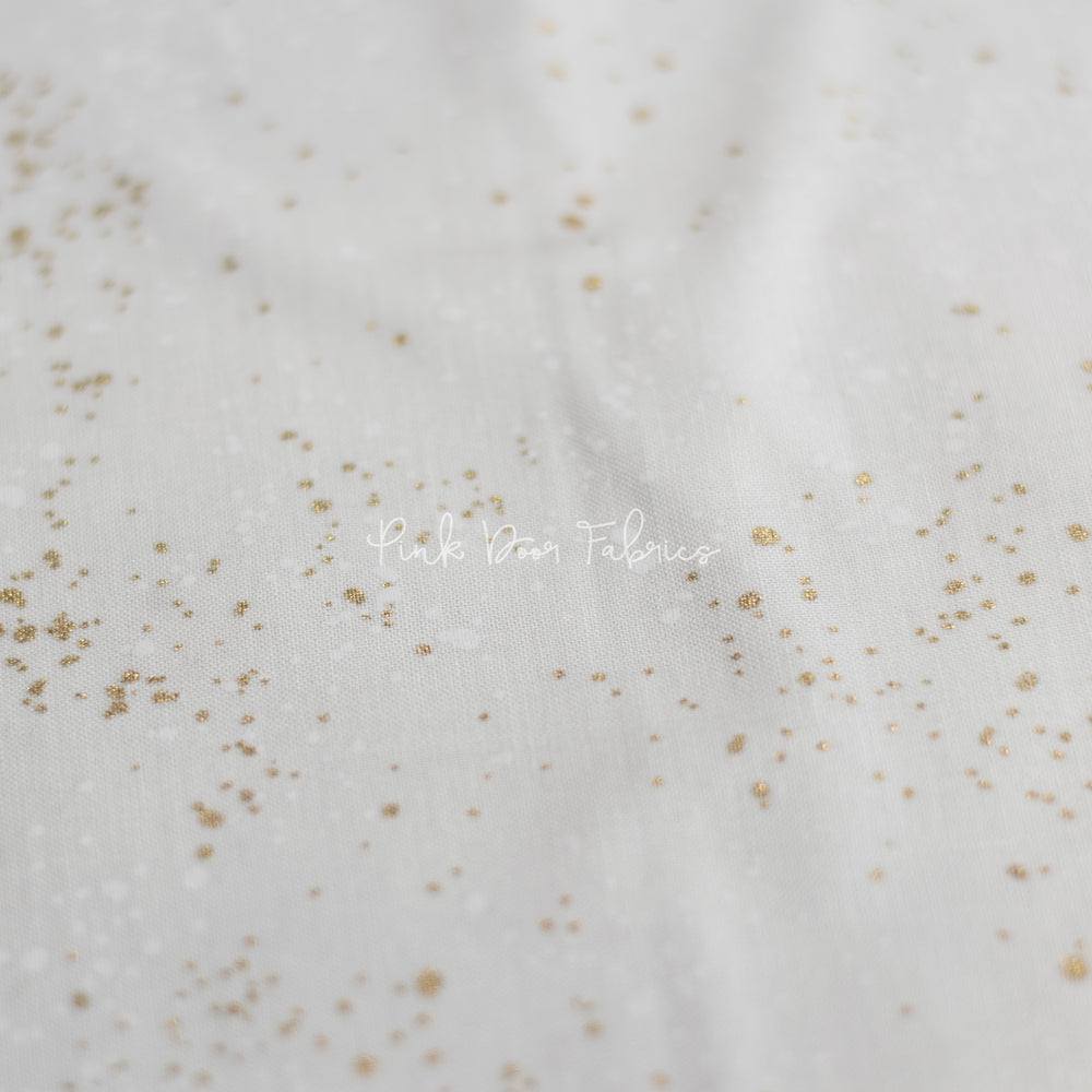 Cotton quilting fabric pattern called 'White Gold'. Part of the 'Speckled Metallic' fabric collection. Designed by Ruby Star Society for fabric company Moda Fabrics. SKU: RS5027 14M. 44-45 inch width.