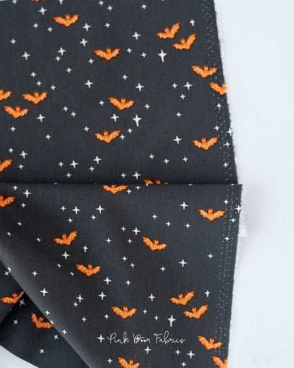 Cotton quilting fabric pattern called 'Winging It in Midnight'. Part of the 'Sweet 'N Spookier' fabric collection. Designed by AGF Studio for fabric company Art Gallery Fabrics. SKU: SNS-13032. 44-45 inch width.