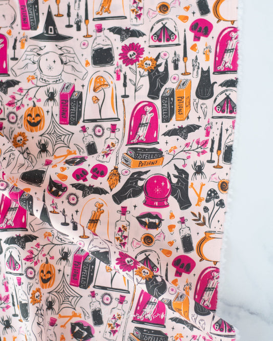 Cotton quilting fabric pattern called 'Witching Hour'. Part of the 'Sweet 'N Spookier' fabric collection. Designed by AGF Studio for fabric company Art Gallery Fabrics. SKU: SNS-13039. 44-45 inch width.