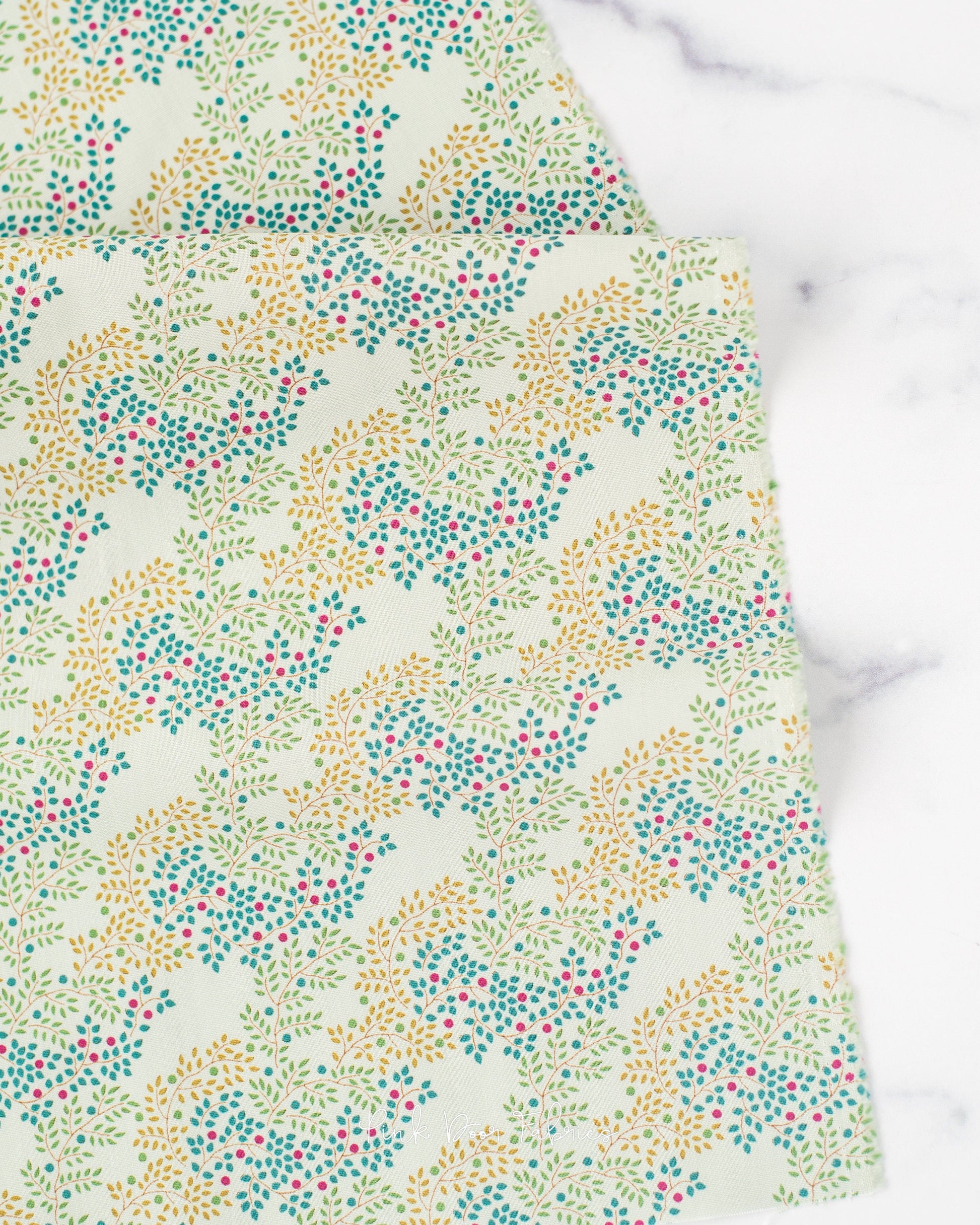 Cotton quilting fabric pattern called 'Berrytangle Sage'. Part of the 'Hometown' fabric collection. Designed by Tilda Fabrics for fabric company Tilda Fabrics. SKU: 100479. 44-45 inch width.