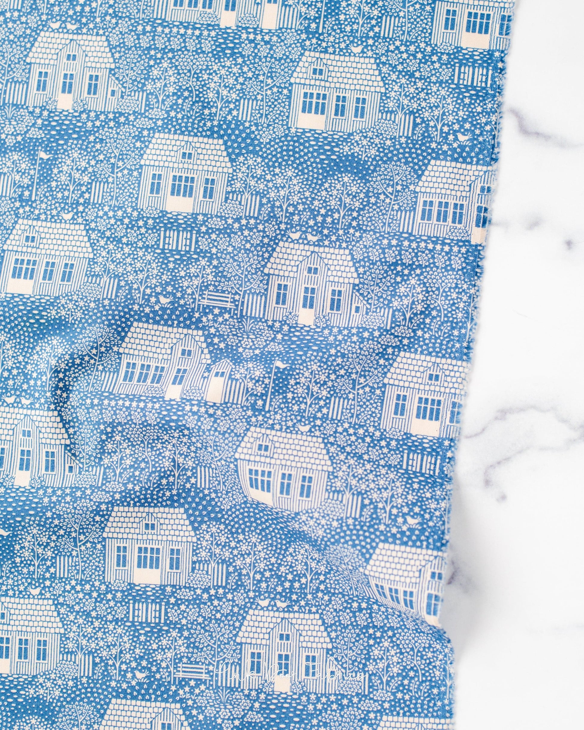 Cotton quilting fabric pattern called 'My Neighborhood Blue'. Part of the 'Hometown' fabric collection. Designed by Tilda Fabrics for fabric company Tilda Fabrics. SKU: 110058. 44-45 inch width.