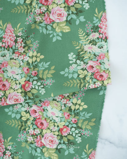 Cotton quilting fabric pattern called 'Whimsyflower in Green'. Part of the 'Chic Escape' fabric collection. Designed by Tilda Fabrics for fabric company Tilda Fabrics. SKU: 100442. 44-45 inch width.