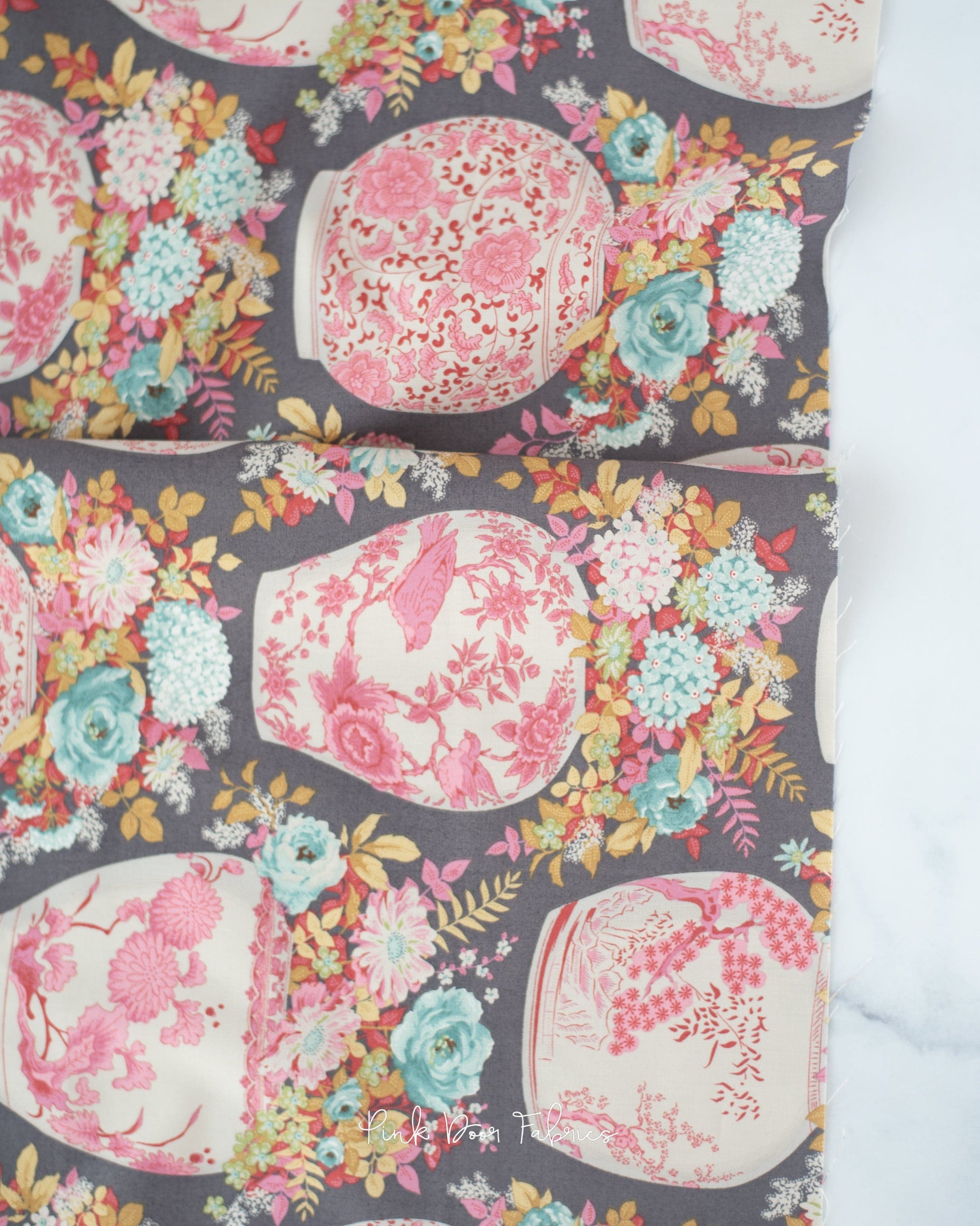 Cotton quilting fabric pattern called 'Flowervase in Grey'. Part of the 'Chic Escape' fabric collection. Designed by Tilda Fabrics for fabric company Tilda Fabrics. SKU: 100452. 44-45 inch width.