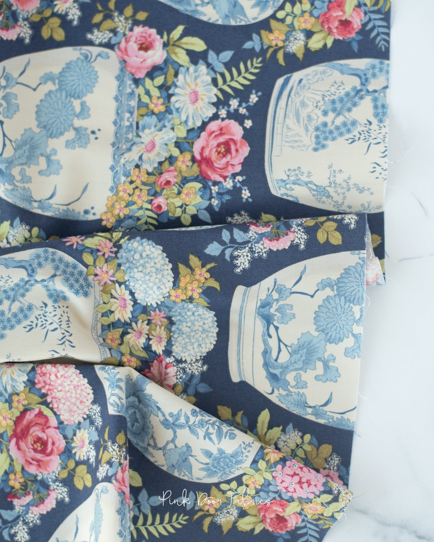Cotton quilting fabric pattern called 'Flowervase in Blue'. Part of the 'Chic Escape' fabric collection. Designed by Tilda Fabrics for fabric company Tilda Fabrics. SKU: 100450. 44-45 inch width.