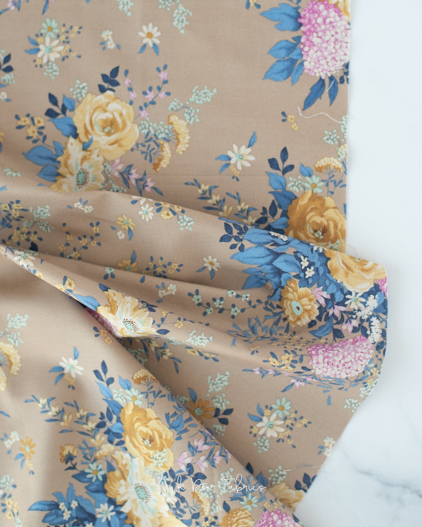 Cotton quilting fabric pattern called 'Wildgarden in Sand'. Part of the 'Chic Escape' fabric collection. Designed by Tilda Fabrics for fabric company Tilda Fabrics. SKU: 100447. 44-45 inch width.