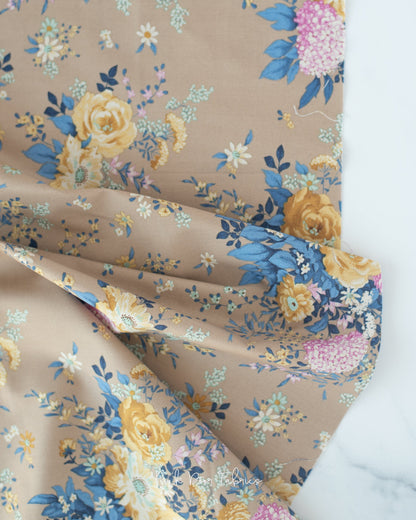 Cotton quilting fabric pattern called 'Wildgarden in Sand'. Part of the 'Chic Escape' fabric collection. Designed by Tilda Fabrics for fabric company Tilda Fabrics. SKU: 100447. 44-45 inch width.