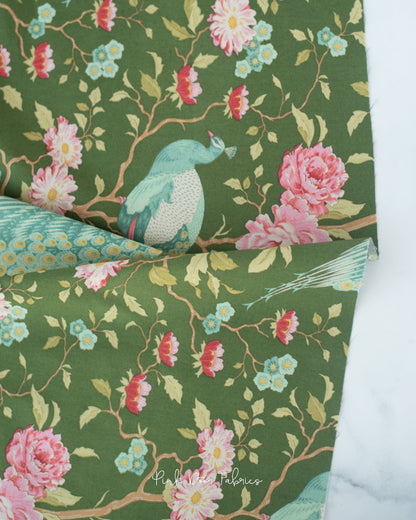 Cotton quilting fabric pattern called 'Peacock Tree in Green'. Part of the 'Chic Escape' fabric collection. Designed by Tilda Fabrics for fabric company Tilda Fabrics. SKU: 100441. 44-45 inch width.
