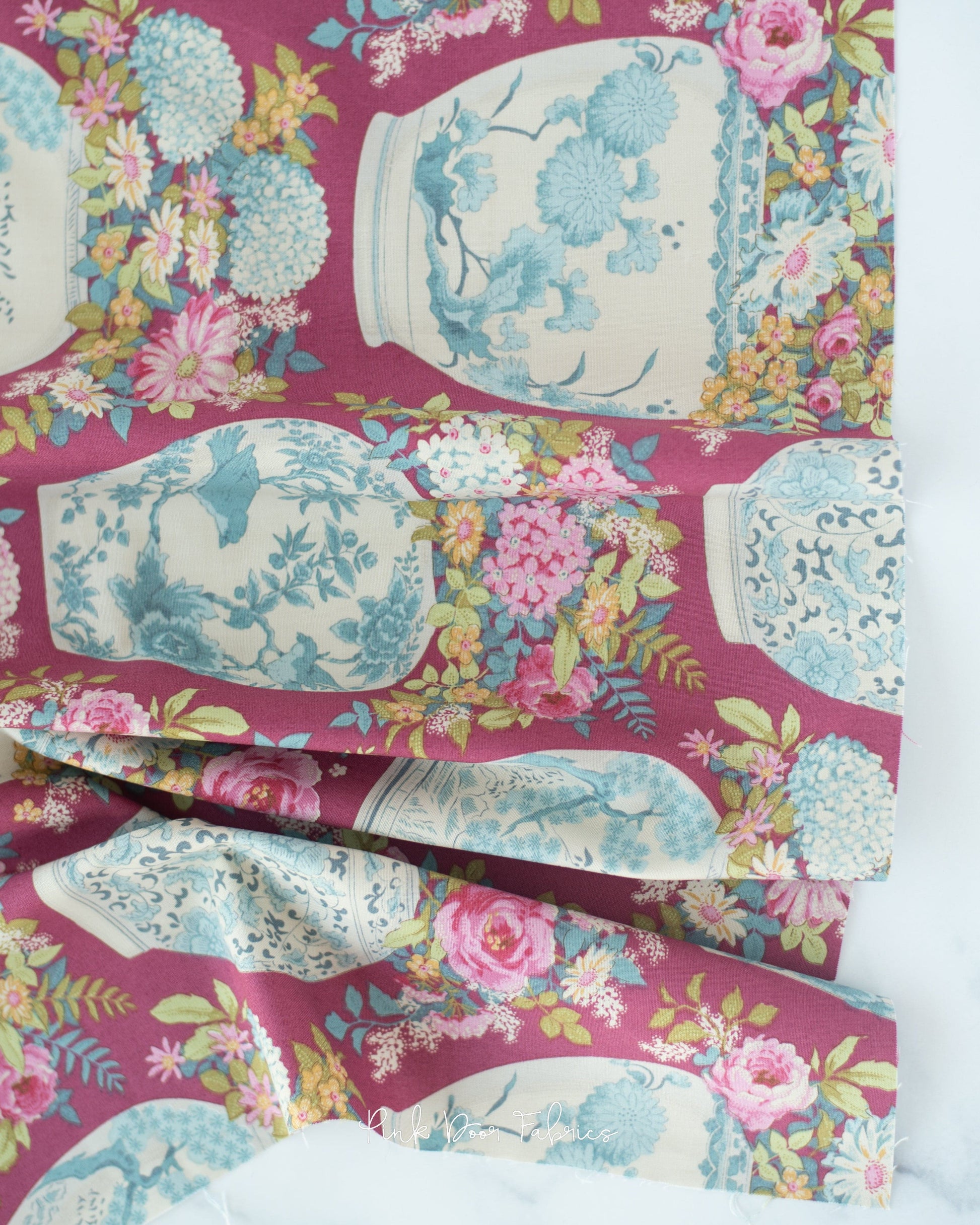 Cotton quilting fabric pattern called 'Flowervase in Maroon'. Part of the 'Chic Escape' fabric collection. Designed by Tilda Fabrics for fabric company Tilda Fabrics. SKU: 100459. 44-45 inch width.