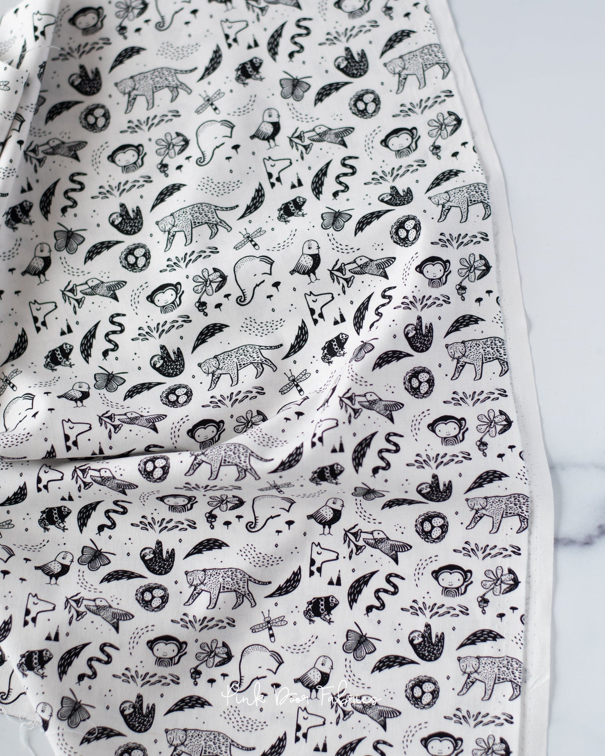 Cotton quilting fabric pattern called 'Creatures in White'. Part of the 'Wee Gallery' fabric collection. Designed by Dear Stella Designs for fabric company Dear Stella Designs. SKU: WG1983-WHITE. 44-45 inch width.