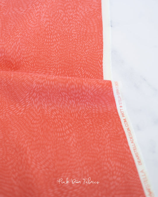 Cotton quilting fabric pattern called 'Dash Flow in Tangerine'. Part of the 'Wild Winter' fabric collection. Designed by Rae Ritchie for fabric company Dear Stella Designs. SKU: SRR1300-TANG. 44-45 inch width.