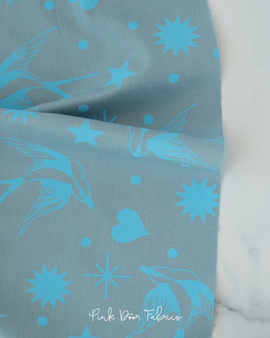 Cotton quilting fabric pattern called 'Fairy Flakes in Aura'. Part of the '2023 True Colors' fabric collection. Designed by Tula Pink for fabric company Free Spirit Fabrics. SKU: PWTP157.AURA. 44-45 inch width.